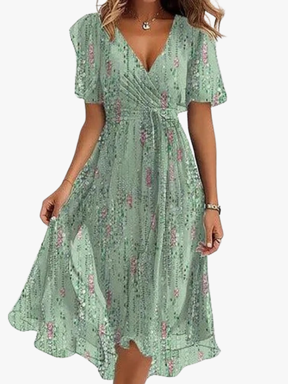 Rhea Elegant Dress in vibrant colors, perfect for wedding guests, made from lightweight fabric for comfort and style. 1