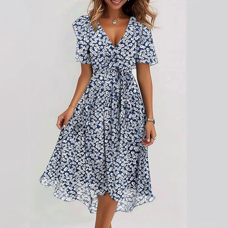 Rhea Elegant Dress in vibrant colors, perfect for wedding guests, made from lightweight fabric for comfort and style. 2