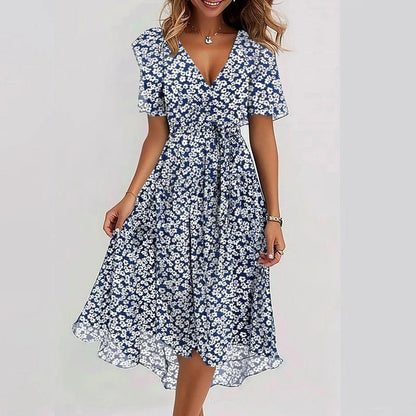 Rhea Elegant Dress in vibrant colors, perfect for wedding guests, made from lightweight fabric for comfort and style. 2