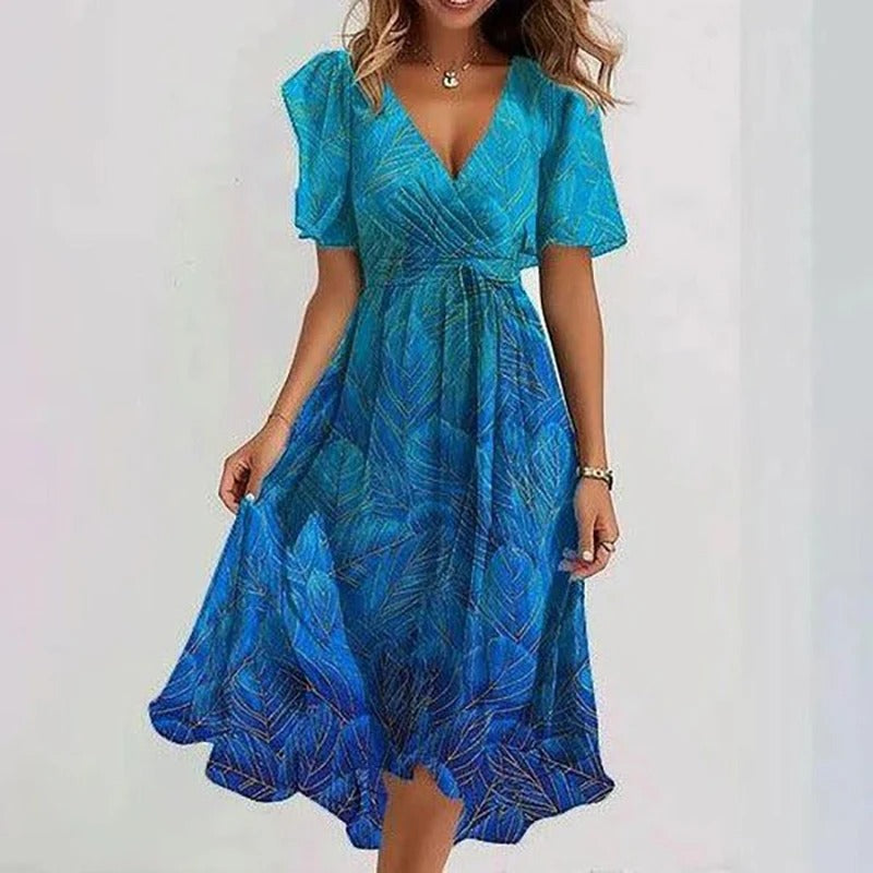 Rhea Elegant Dress in vibrant colors, perfect for wedding guests, made from lightweight fabric for comfort and style. 3