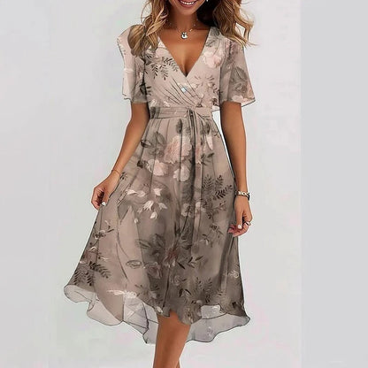 Rhea Elegant Dress in vibrant colors, perfect for wedding guests, made from lightweight fabric for comfort and style. 4