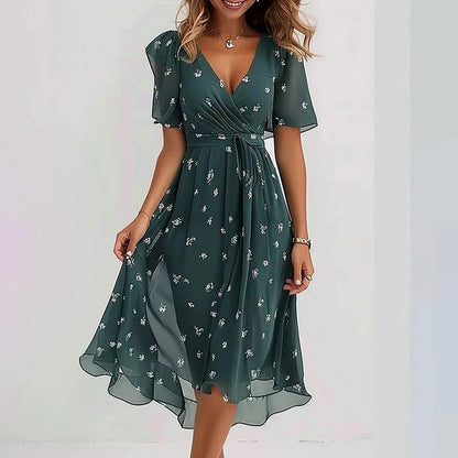 Rhea Elegant Dress in vibrant colors, perfect for wedding guests, made from lightweight fabric for comfort and style. 5