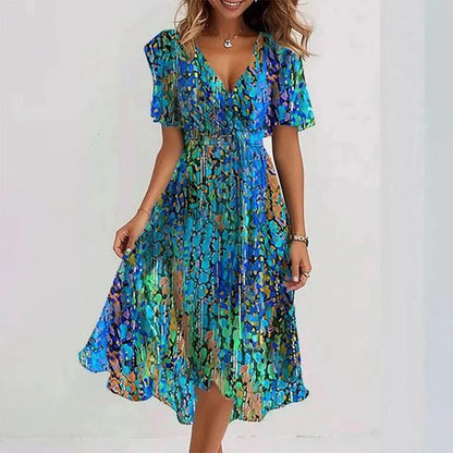 Rhea Elegant Dress in vibrant colors, perfect for wedding guests, made from lightweight fabric for comfort and style. 8