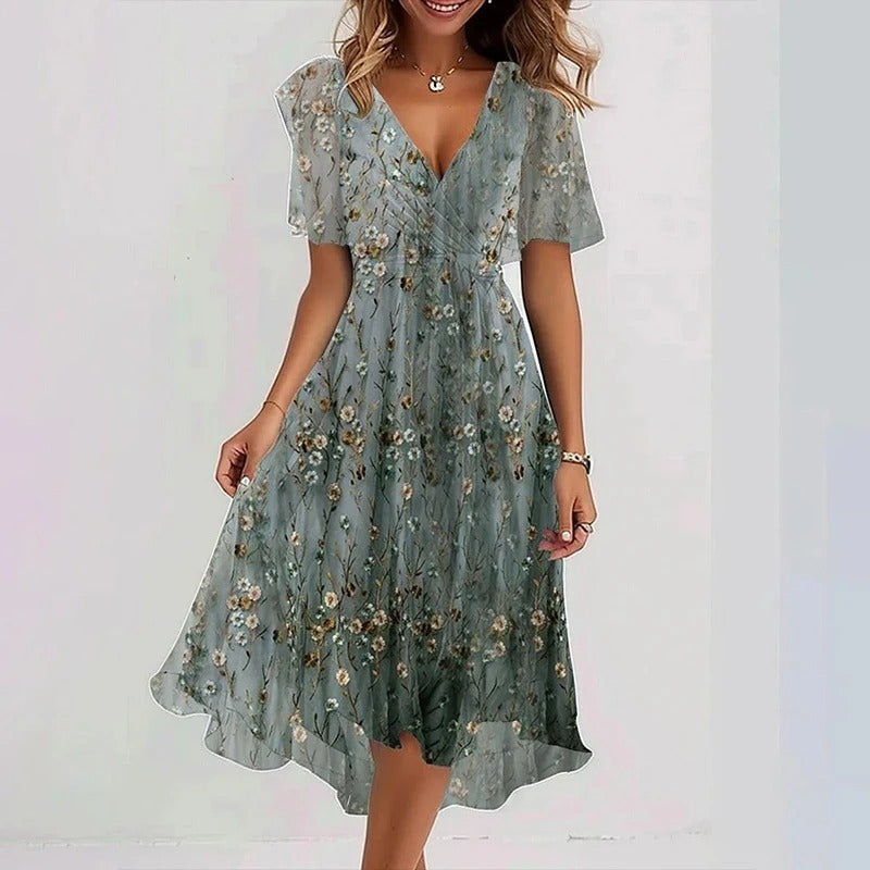 Rhea Elegant Dress in vibrant colors, perfect for wedding guests, made from lightweight fabric for comfort and style. 9