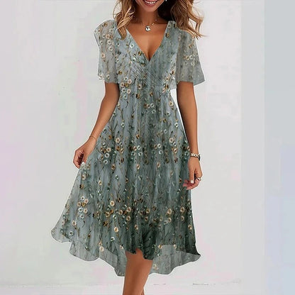 Rhea Elegant Dress in vibrant colors, perfect for wedding guests, made from lightweight fabric for comfort and style. 9