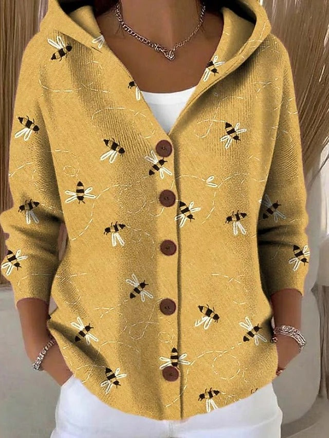 Lightweight women's hooded vest featuring a stylish patchwork design, perfect for layering in transitional weather. 2