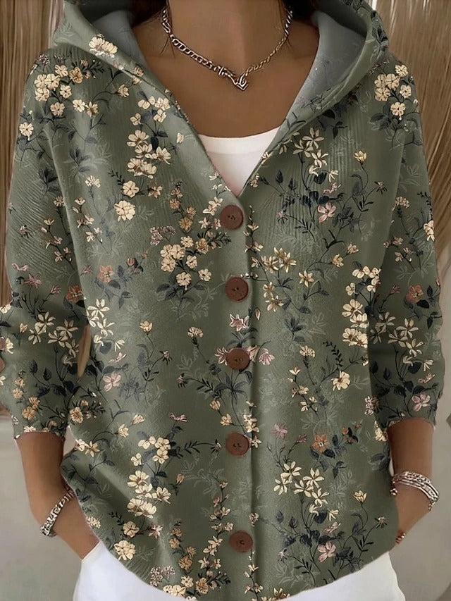 Lightweight women's hooded vest featuring a stylish patchwork design, perfect for layering in transitional weather. 4