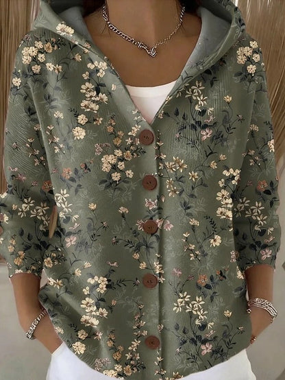 Lightweight women's hooded vest featuring a stylish patchwork design, perfect for layering in transitional weather. 4