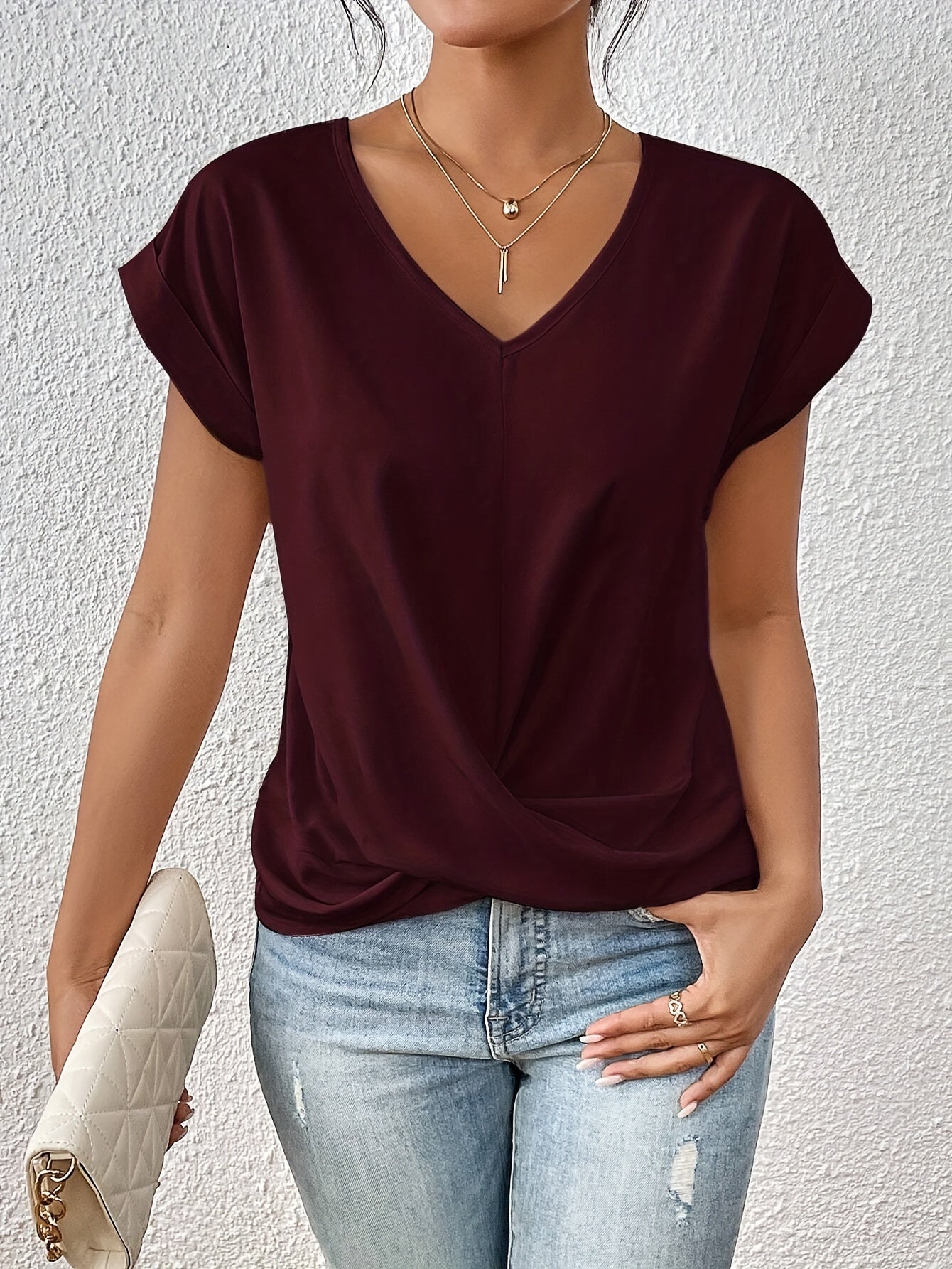 Vela Women's T Shirt featuring a lightweight stretch fabric and stylish V-neck design, perfect for casual wear and comfortable fit. 3