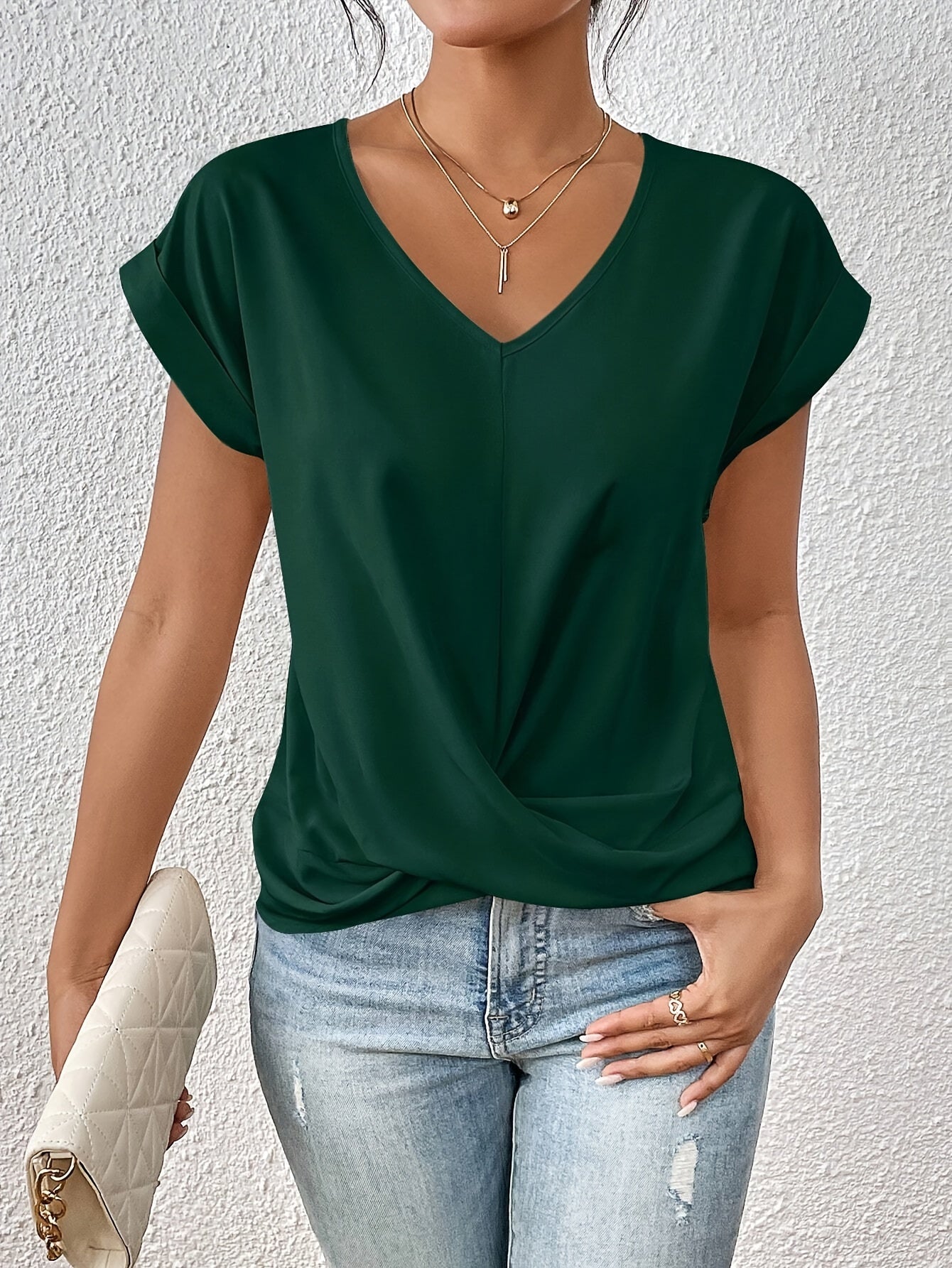 Vela Women's T Shirt featuring a lightweight stretch fabric and stylish V-neck design, perfect for casual wear and comfortable fit. 6