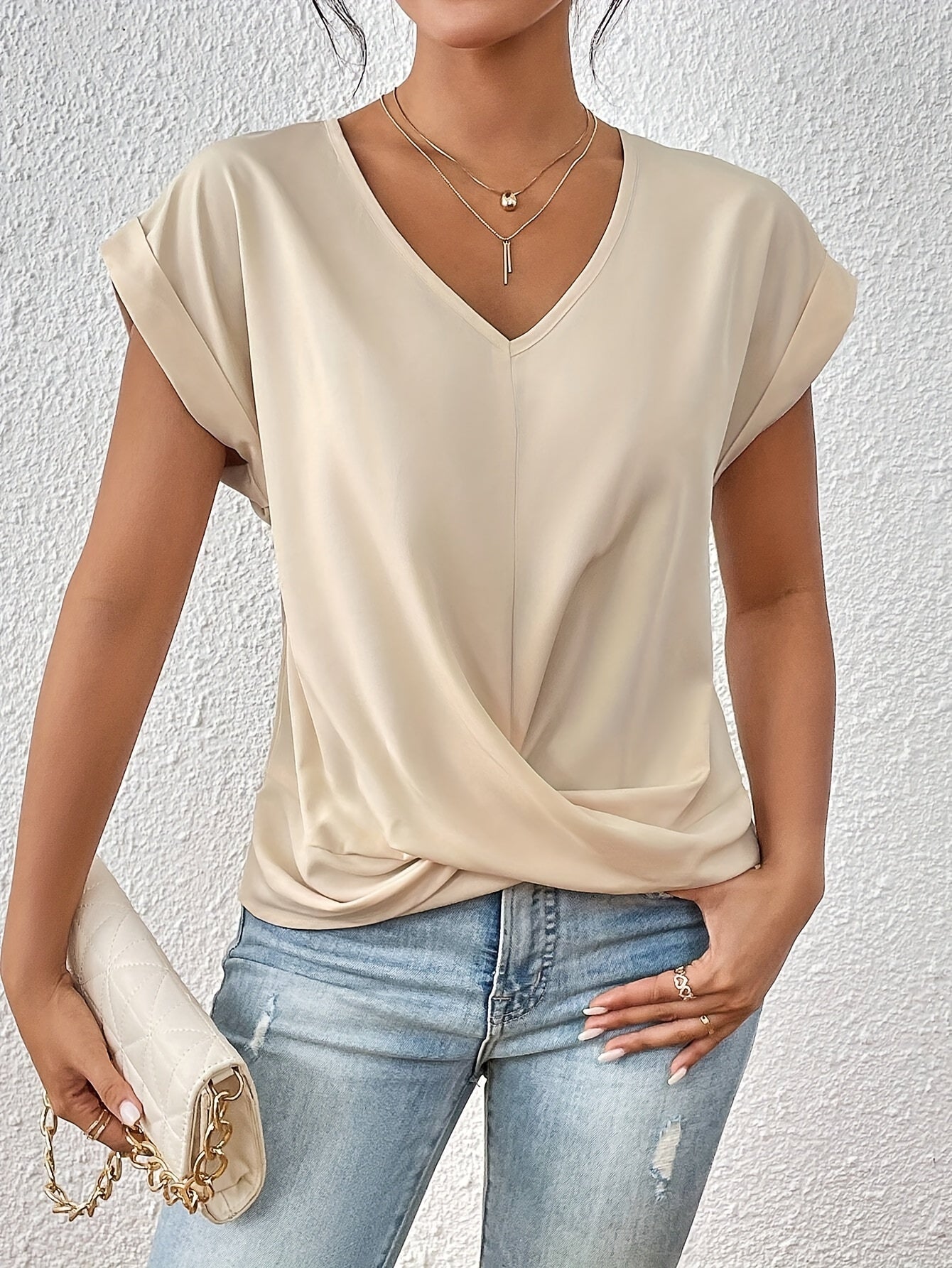 Vela Women's T Shirt featuring a lightweight stretch fabric and stylish V-neck design, perfect for casual wear and comfortable fit. 7