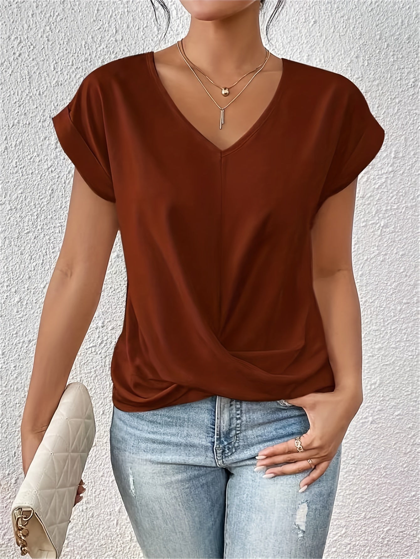 Vela Women's T Shirt featuring a lightweight stretch fabric and stylish V-neck design, perfect for casual wear and comfortable fit. 8